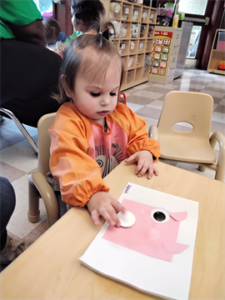 Toddler: Concentrating on a process oriented pink project